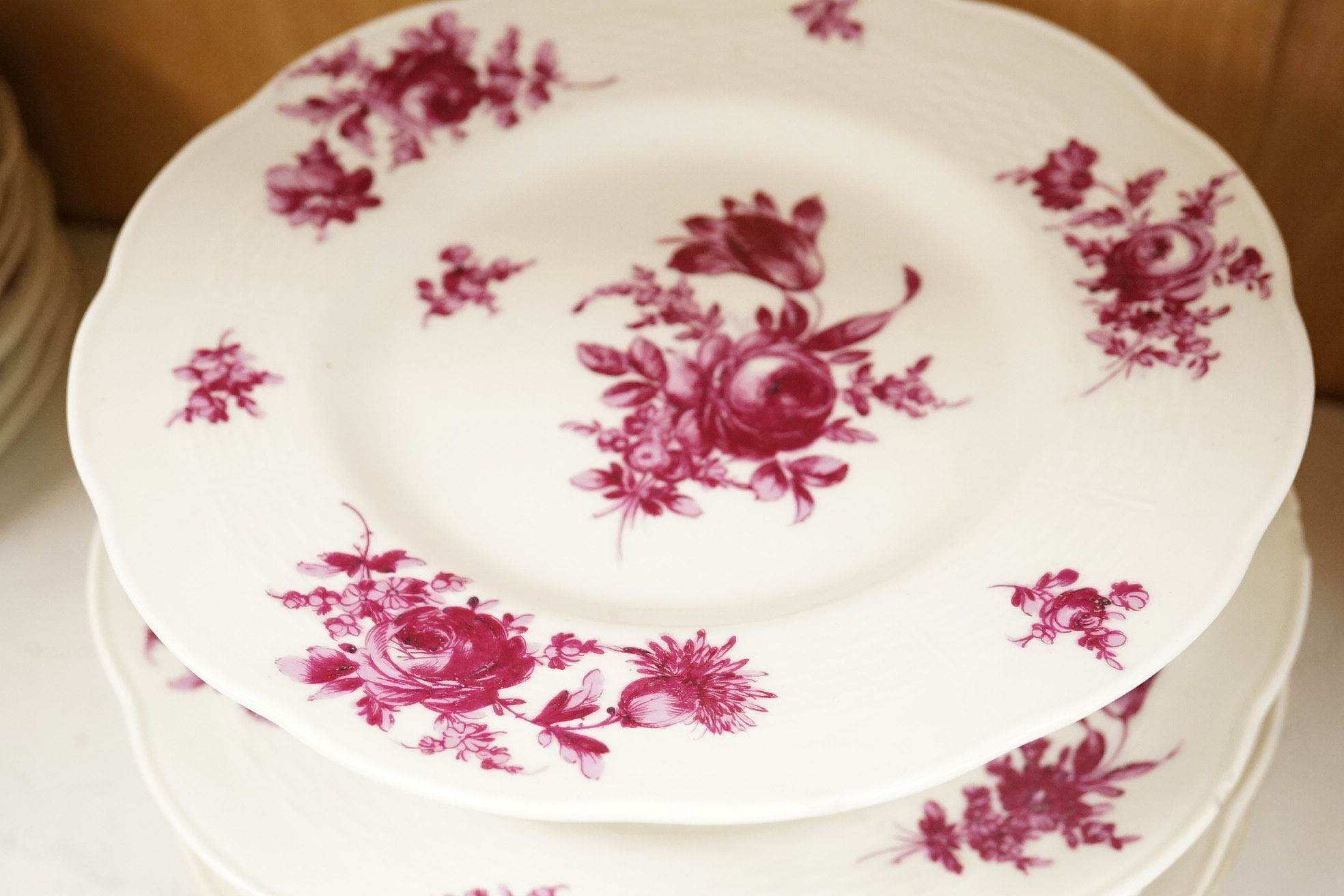 A Theodore Haviland, Paris, part dinner service, printed in puce monochrome